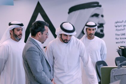 Hamdan bin Muhammad meets AI participants at DCAI