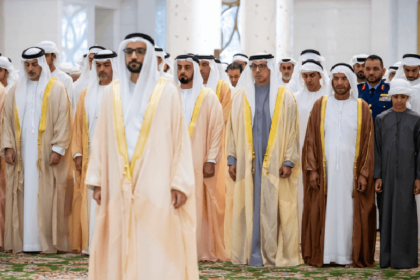 UAE officials during prayer