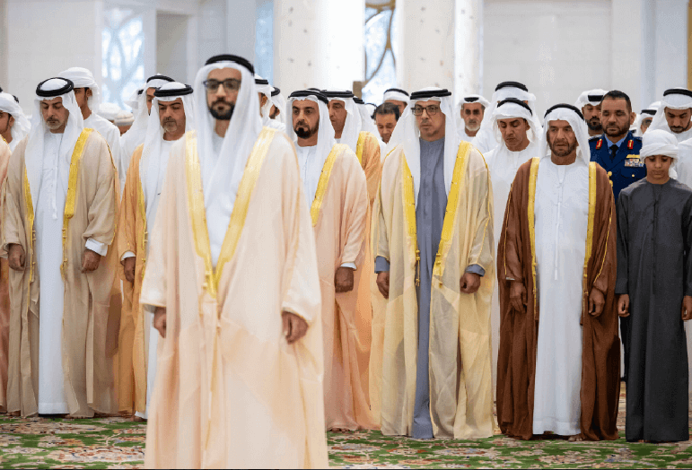 UAE officials during prayer